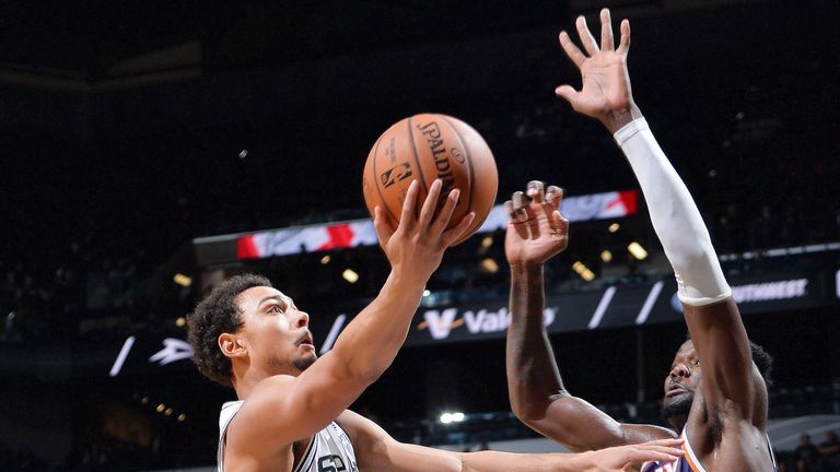Bryn Forbes attempts a lay-up against the Phoenix Suns