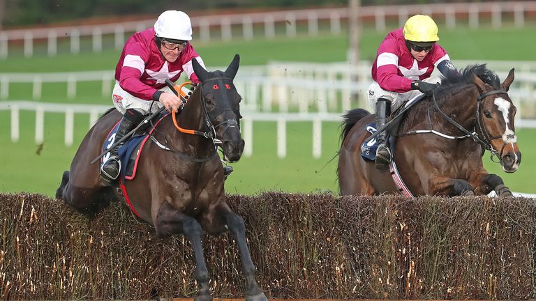 Delta Work ridden by Davy Russell (left) jumps the last to win the Neville Hotels Novice Chase