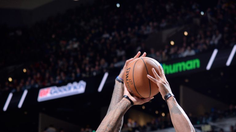 DeMar DeRozan shoots over Denver's Torrey Craig