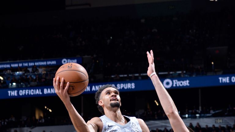 Derrick White swoops to score against Denver