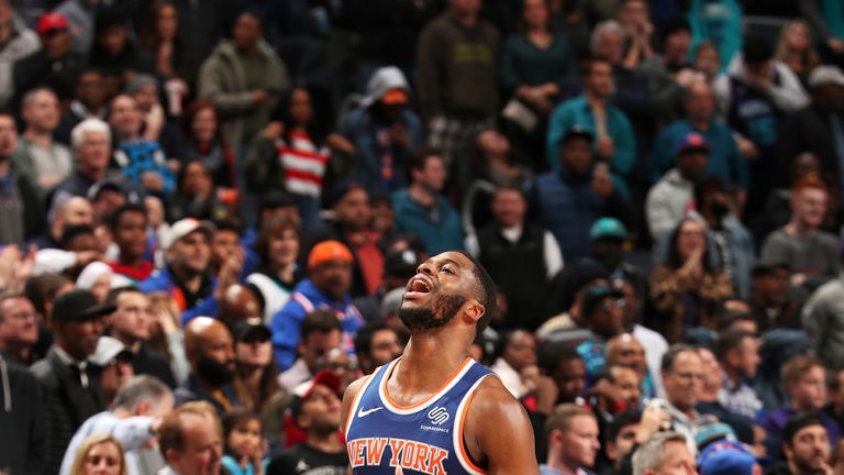 Emmanuel Muiday celebrates after scoring a crucial basket against Charlotte