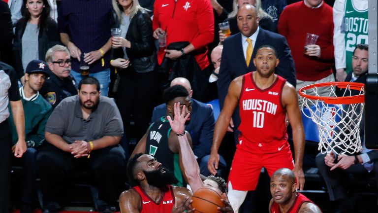 James Harden attacks the rim against Boston