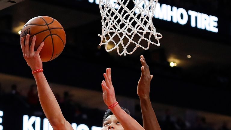 Jeremy Lin attacks the basket against Washington