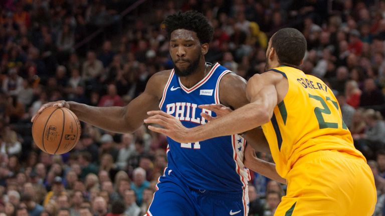 Joel Embiid backs down Rudy Gobert