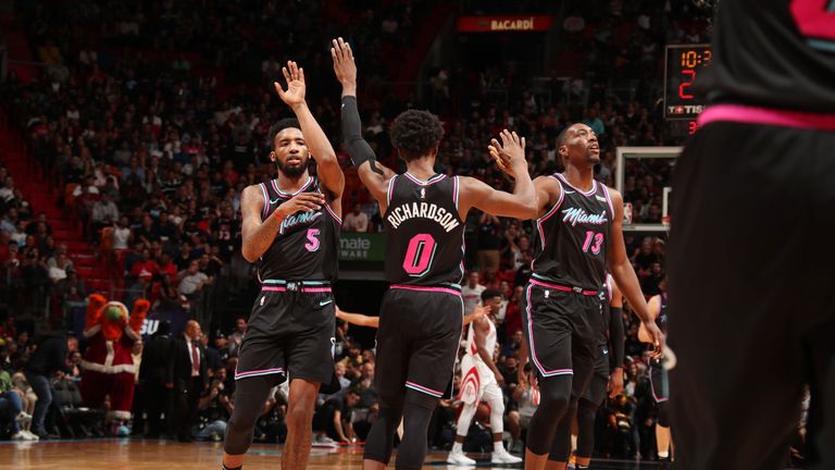 Josh Richardson high-fives his Heat team-mates