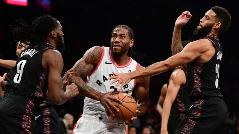 Kawhi Leonard attacks the basket against Brooklyn