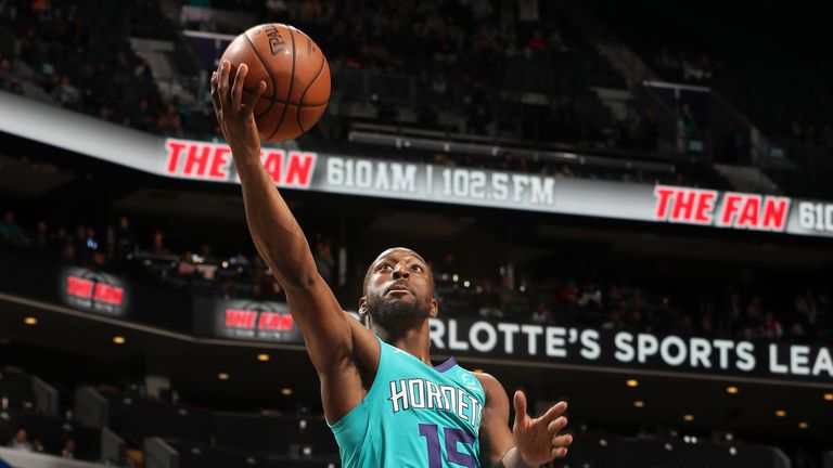 Kemba Walker scores with a lay-up