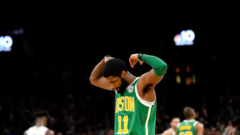 Kyrie Ieving flexes after guiding Boston to overtime victory