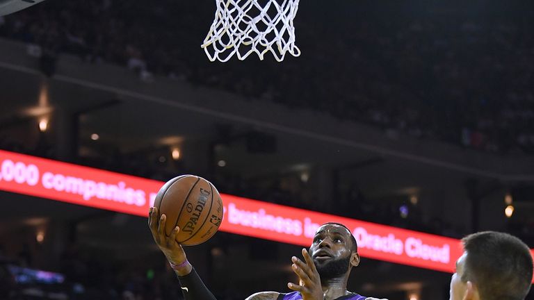 LeBron James elevates for a lay-up against Golden State