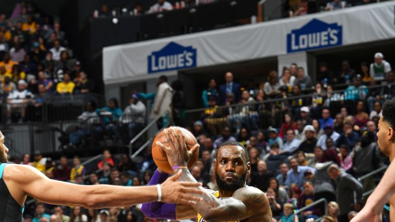 LeBron James initiates the Lakers' offense against Charlotte