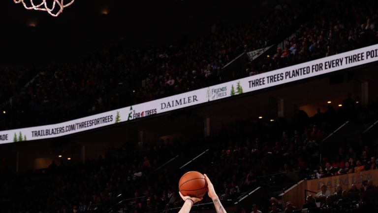 Luka Doncic rises up for a jumper against the Portland Trail Blazers