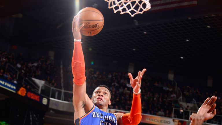 Russell Westbrook scores with a lay-up against Phoenix