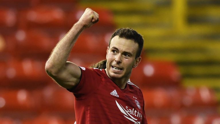 Aberdeen's Andrew Considine celebrates after scoring to make it 5-1