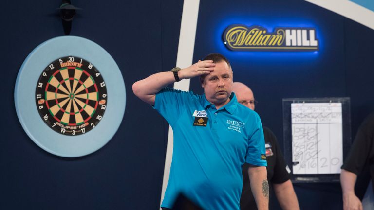 Alan Tabern of England in action against Raymond Smith of Australia during Day Two of the 2019 William Hill World Darts Championship at Alexandra Palace on December 14, 2018 in London, United Kingdom.