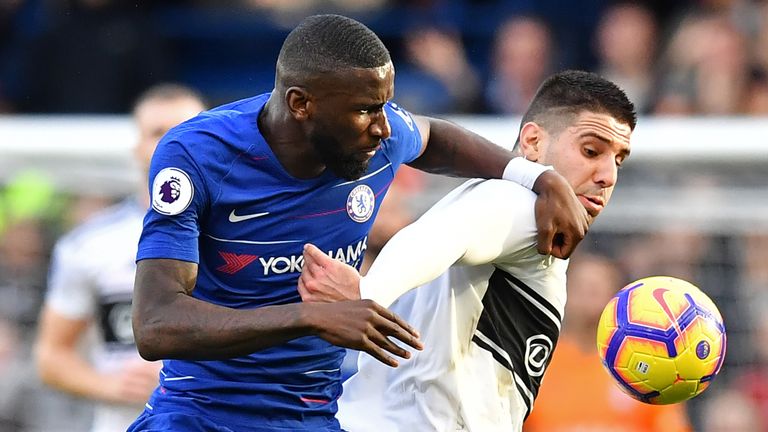 Aleksandar Mitrovic battles for possession with Antonio Rudiger