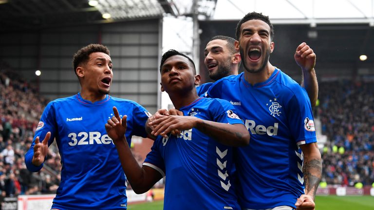 Alfredo Morelos celebrates with team-mates after making it 2-1 to Rangers