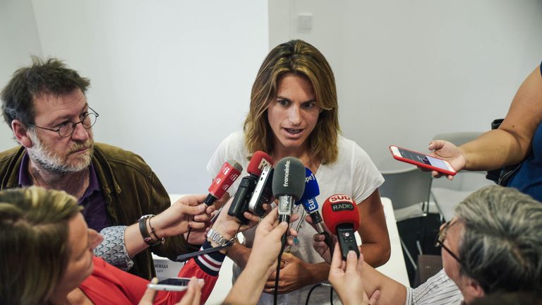 French former world number one Amelie Mauresmo speaks to journalists following a press conference after she became the first woman appointed to captain France's Davis Cup team by the French tennis federation on June 23, 2018 in Paris