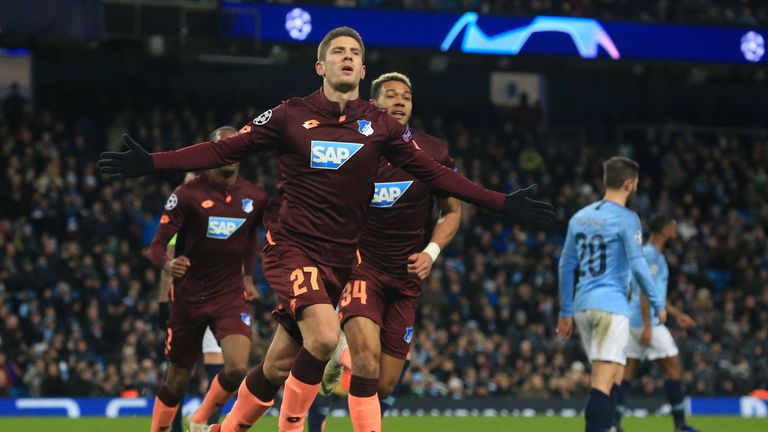 Hoffenheim's Croatian striker Andrej Kramaric celebrates after scoring the opening goal from the penalty spot during the UEFA Champions League group F football match between Manchester City and Hoffenheim at the Etihad stadium in Manchester, north west England on December 12, 2018