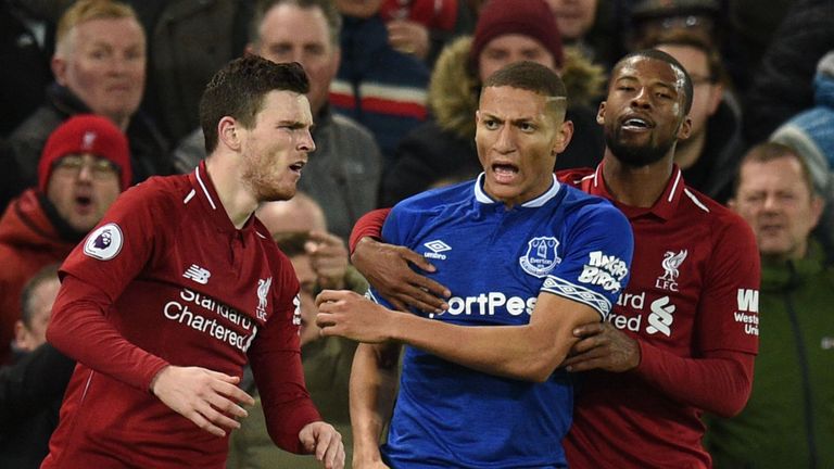 Andrew Robertson and Richarlison clash