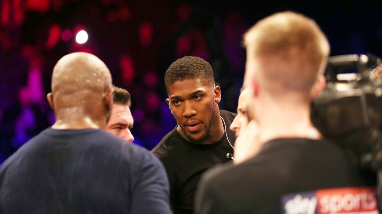 Anthony Joshua speaks with Dillian Whyte after the fight at the O2 Arena, London.