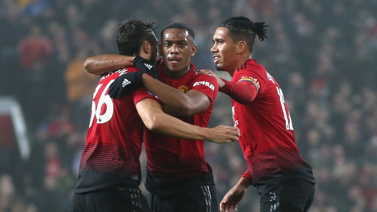 Anthony Martial celebrates his equaliser with team-mates