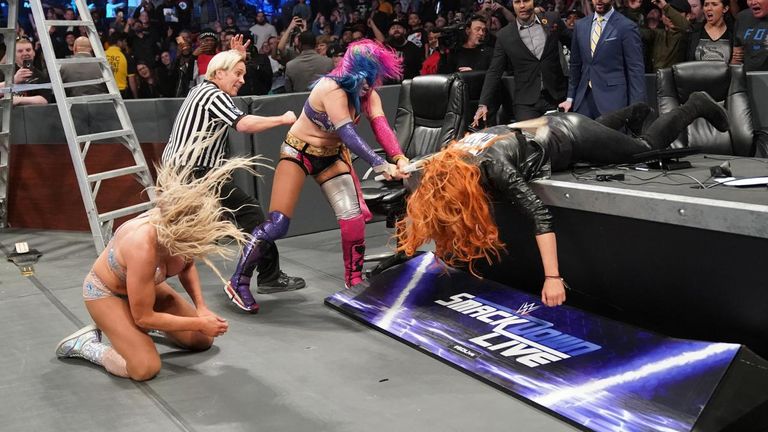 The match between Asuka and Charlotte Flair descended into a three-way brawl which also involved SmackDown champion Becky Lynch