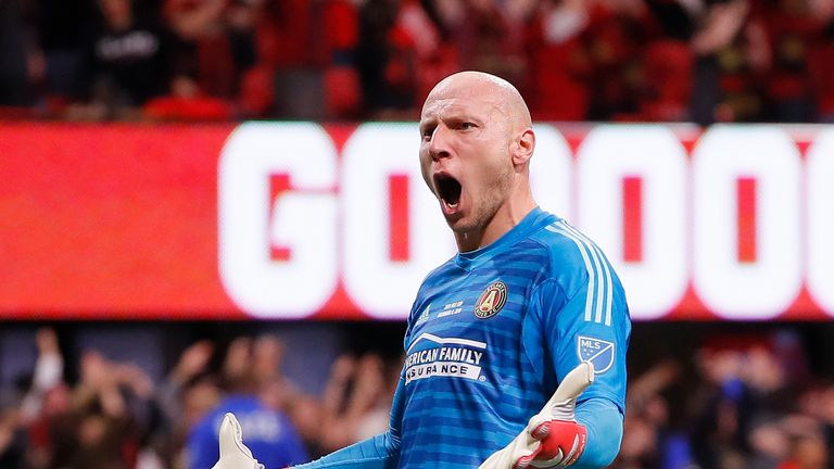 Brad Guzan celebrates Atlanta's opener in front of a bumper crowd