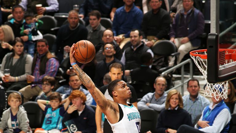 CHARLOTTE, NC - NOVEMBER 30:  Miles Bridges #0 of the Charlotte Hornets dunks the ball against the Utah Jazz on November 30, 2018 at Spectrum Center in Charlotte, North Carolina. NOTE TO USER: User expressly acknowledges and agrees that, by downloading and or using this photograph, User is consenting to the terms and conditions of the Getty Images License Agreement.  Mandatory Copyright Notice:  Copyright 2018 NBAE (Photo by Brock Williams-Smith/NBAE via Getty Images)