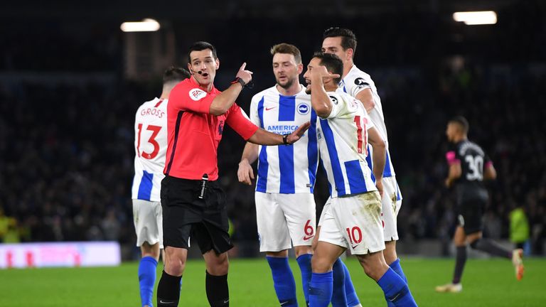 Andrew Madley consulted with his assistant before awarding Brighton the opener