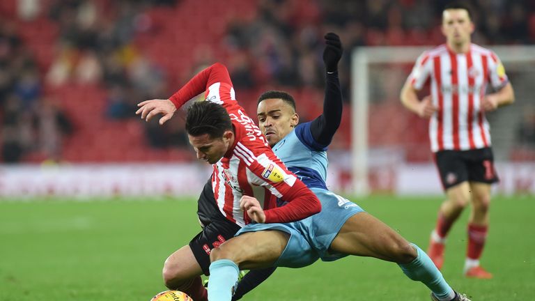 Paris Cowan-Hall of Wycombe Wanderers battles for possession with Bryan Ovideo of Sunderland during the Sky Bet League One match between Sunderland and Wycombe Wanderers at Stadium of Light on November 17, 2018 in Sunderland, United Kingdom.