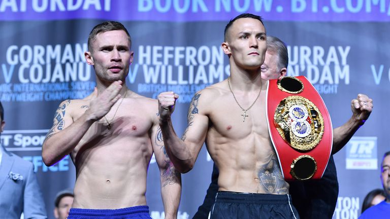 Carl Frampton (left) and Josh Warrington during the weigh-in at Manchester Central
