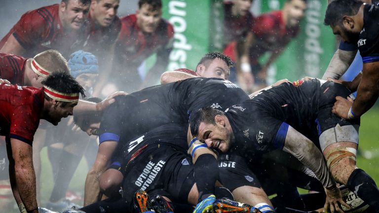 Thibault Lassalle grabs the ball at the base of a ruck as Castres hammer the Munster line