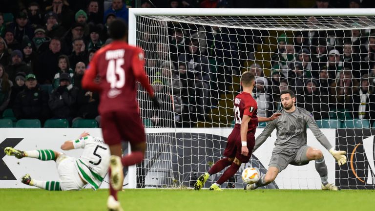 Celtic goalkeeper Craig Gordon makes a crucial save against RB Salzburg