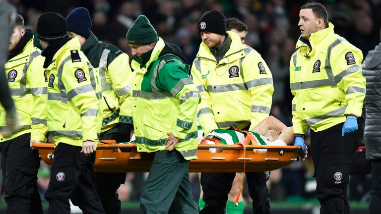 Celtic's Ryan Christie is stretchered off against RB Salzburg
