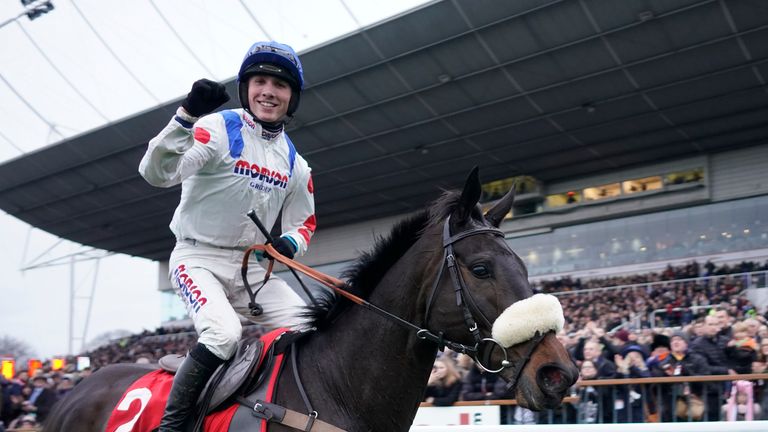 Harry Cobden celebrates after riding Clan des Obeaux to win The 32Red King George VI Chase at Kempton Park on December 26, 2018 in Sunbury, England