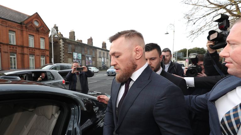 Conor McGregor leaves Dublin District Court after appearing in relation to motoring offences.