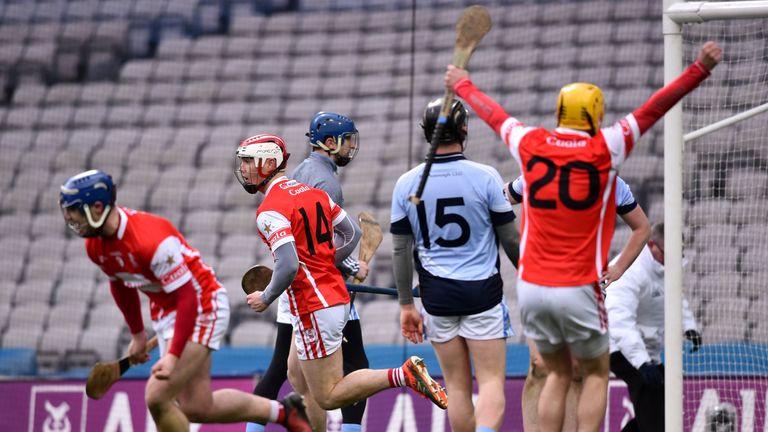 Cuala players celebrate the last-minute goal