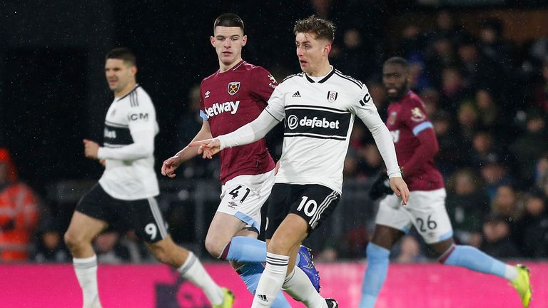 Declan Rice and Tom Cairney in action at Craven Cottage