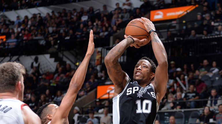 DeMar DeRozan #10 of the San Antonio Spurs shoots the ball during the game against the Portland Trail Blazers on December 2, 2018 at the AT&T Center in San Antonio, Texas.