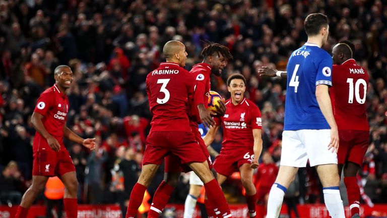 Divock Origi celebrates his 96th minute winner