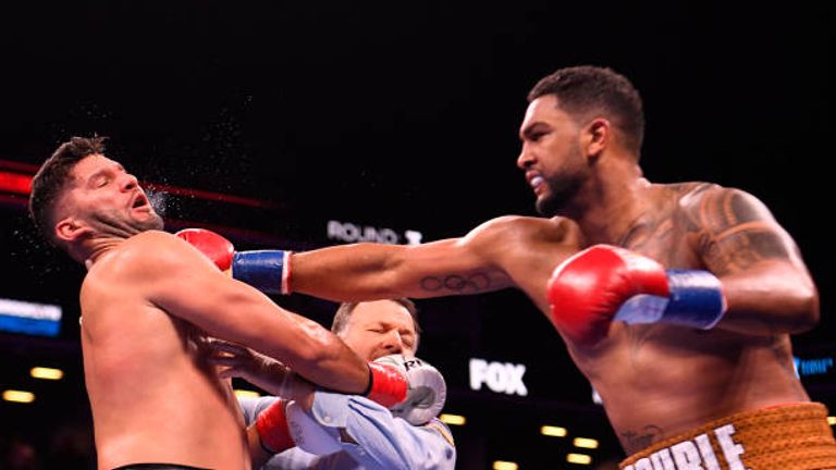 Dominic Breazeale punches Carlos Negron during their Heavyweights bout at Barclays Center on December 22, 2018 in the Brooklyn borough of New York City. (Photo by Sarah Stier/Getty Images)