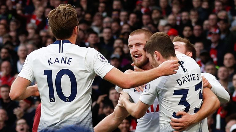 Eric Dier is congratulated by his team-mates after scoring Tottenham's equaliser