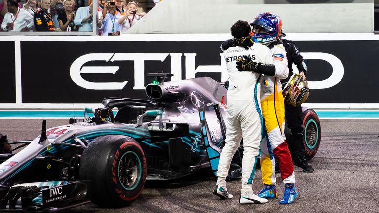 After his final race in F1, Fernando Alonso is given a hug by Abu Dhabi GP victor Lewis Hamilton – his team-mate during a single, tumultuous season ten years earlier at McLaren. Picture by Lars Baron, Getty Images.
