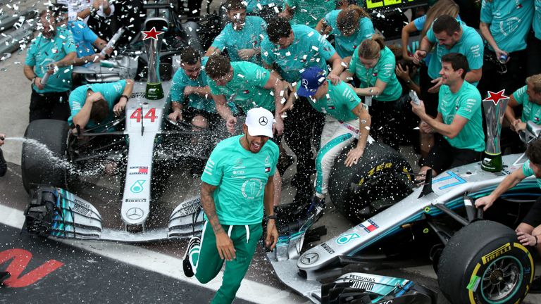 The Mercedes team celebrate wrapping up a fifth consecutive Constructors’ Championship title following Lewis Hamilton’s victory in the Brazilian GP. Picture by Charles Coates, Getty Images.