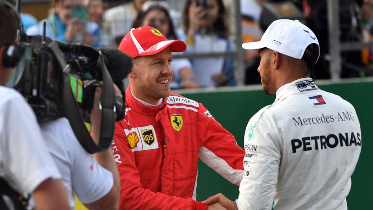 A year on from their on-track confrontation at Baku, Lewis Hamilton and Sebastian Vettel share a sporting handshake following qualifying for April’s Azerbaijan GP. Despite locked in an exclusive and intense fight for the world title, Hamilton and Vettel remained friendly and respectful rivals throughout. Pictures by Andrej Isakovic, Getty Images.