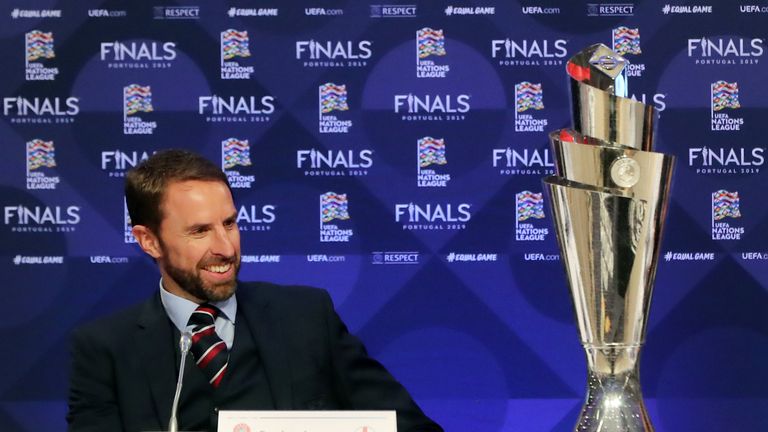 England manager Gareth Southgate stares at the Nations League trophy during the Finals draw