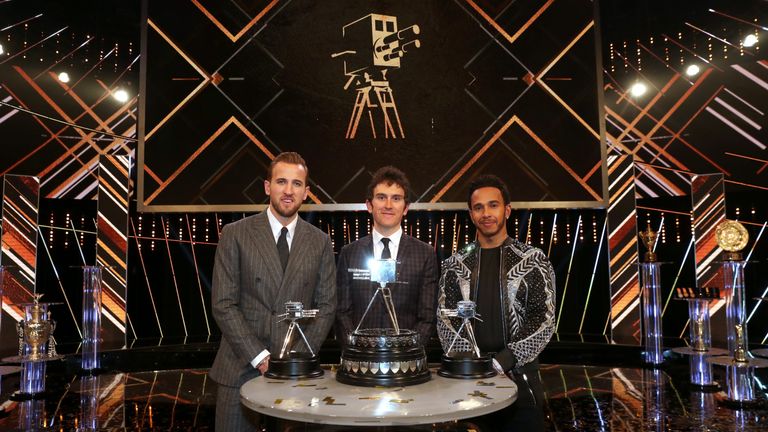 Geraint Thomas (centre) poses after winning the BBC Sports Personality of the Year award alongside third placed Harry Kane (left) and second placed Lewis Hamilton