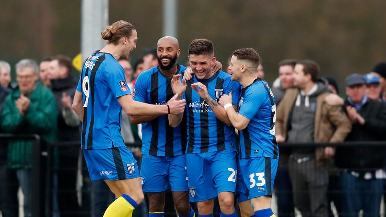 Gillingham celebrate Darren Oldaker's goal during their win over Slough Town
