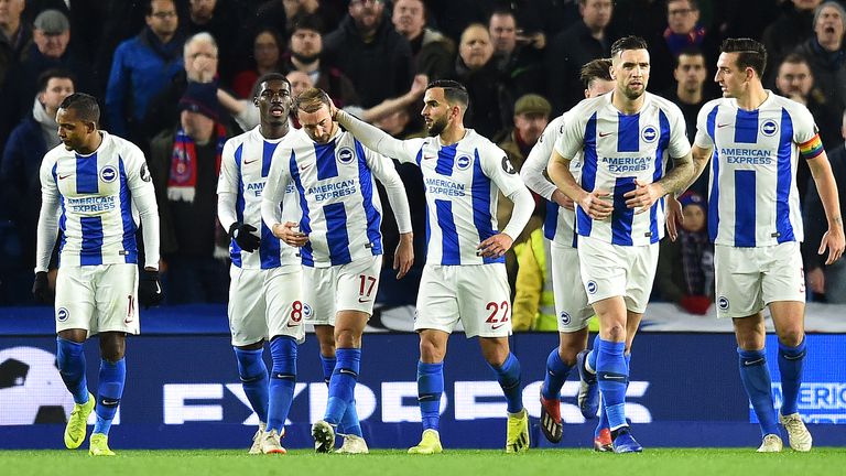 Glenn Murray celebrates with team-mates after scoring Brighton's first goal