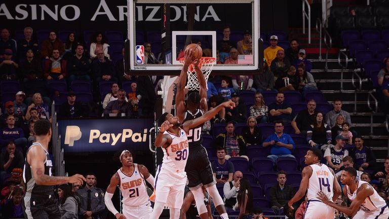 Harry Giles #20 of the Sacramento Kings dunks the ball against the Phoenix Suns on December 4, 2018 at Talking Stick Resort Arena in Phoenix, Arizona